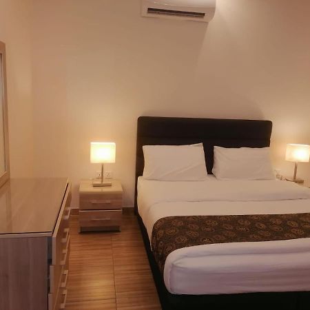 Al-Ahlam Hotel Apartments Aqaba Exterior photo